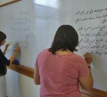 Showing off skills at the Arabic-language workshop.