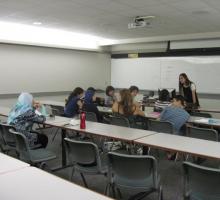 Guest lecturer and Palestinian-American author Ibtisam Barakat leads a class.