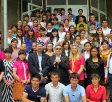 1-The group with writing workshop students on the steps of the school in Angren, Uzbekistan.jpg