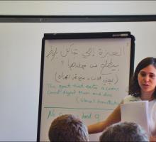 Instructor Anjali Sachdeva compares Arabic and English texts.