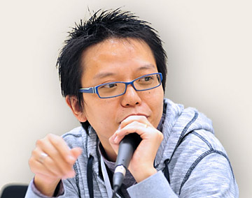 A portrait of Hu Xudong.