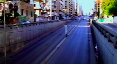 A road linked with buildings in Paros, Greece