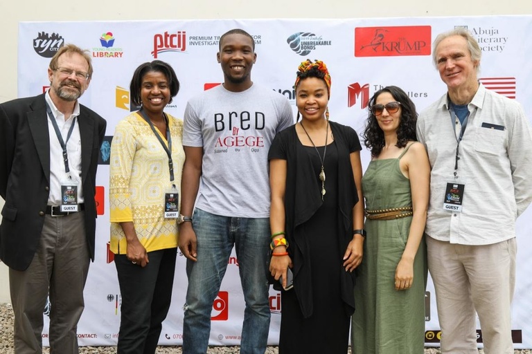 A group of writers from the 2019 Nigeria reading tour pose for a photo.