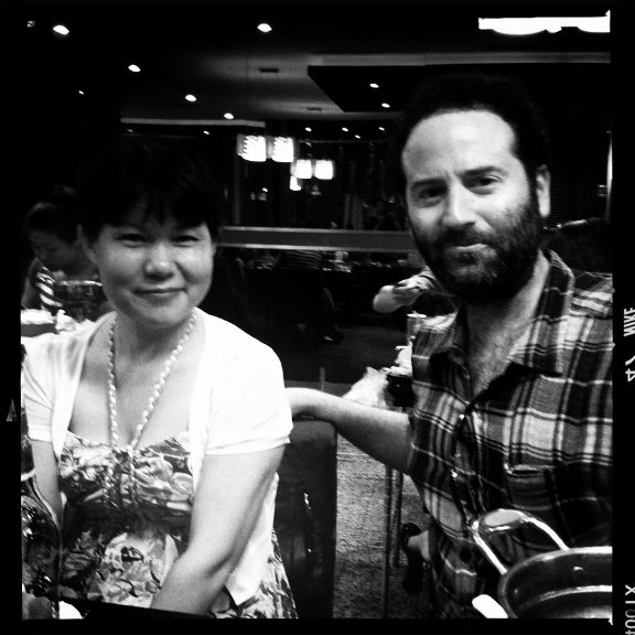 A Mao and Dan O'Brien pose for a quick picture following a meal in Shanghai.