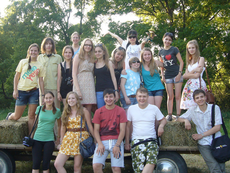 A group of Between the Lines participants pose for a photo.