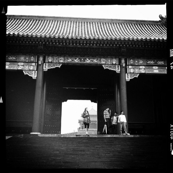 Dora Malech and three other people stand in the Forbidden City.