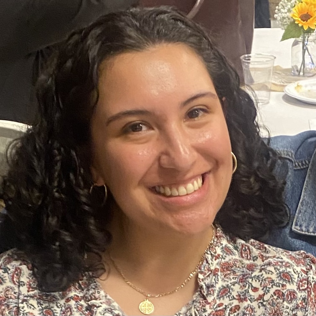 Image of woman with brown hair and smile