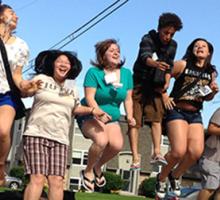 Participants jumping for joy over BTL. 